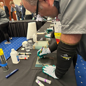 participants cutting glass at an IG Fabricators Workshop